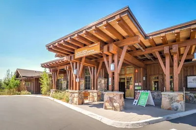 a building with awnings and a sign in front of it at Snow Porch in Truckee