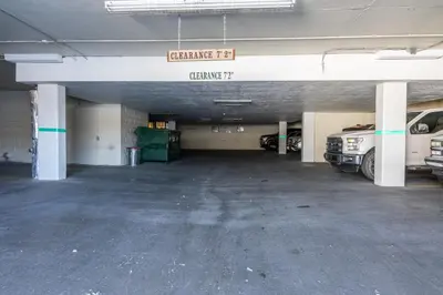 an empty parking garage with cars parked in it at Ski in Ski Out 3 Bedrm 3 Bathrm fully remodeled Sierra Megeve Condo Steps to Canyon Lodge Sleeps 8 in Mammoth Lakes