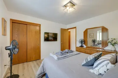 a bedroom with a large bed and a mirror at Hikers Escape Home Near Beach, Golf and Yosemite in Groveland