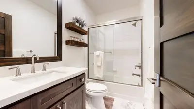 a bathroom with a toilet and a sink and a shower at Snowcreek VII #1403 condo in Mammoth Lakes