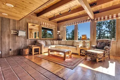 a living room with a couch and a table at Overlooking Beautiful Bear Lake VH#318 in Bear Valley