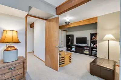 a living room with a couch and a television at Overlooking Beautiful Bear Lake VH#318 in Bear Valley