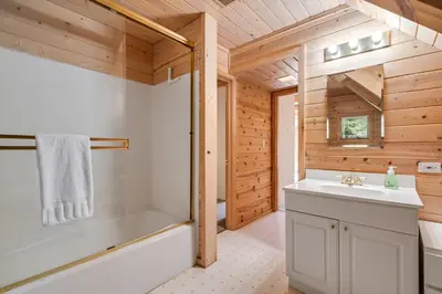 a bathroom with a tub and a sink and a shower at Mountain Getaway with Granny Unit, Dogs Ok #47 in Bear Valley