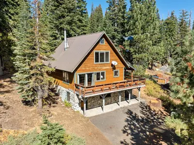 an overhead view of a house in the woods at Mountain Getaway with Granny Unit, Dogs Ok #47 in Bear Valley