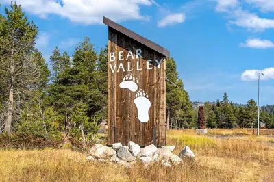 a sign for a bear valley in a field at Modern Condo - Great Location! in Bear Valley