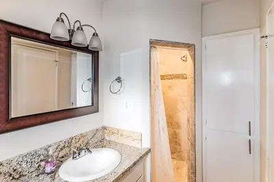 a bathroom with a sink and a shower at Pine Ridge Peak in Oakhurst
