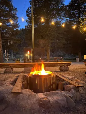 a fire pit in a park at night at Willow Springs Resort in Bridgeport