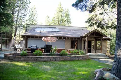 a small house with a porch and a patio at 1 Bedroom Premium Condos in Mammoth Lakes