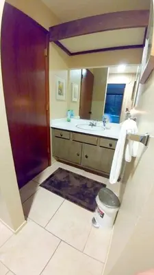 a bathroom with a sink and a mirror at Standard Condos with Free Parking in Mammoth Lakes
