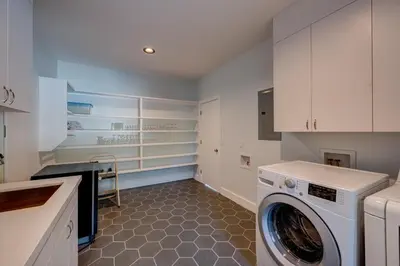 a laundry room with a washer and dryer at Mountain & Lake-View Delight in Truckee
