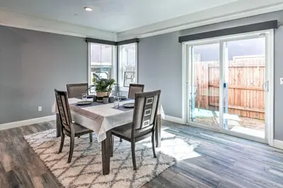 a dining room with a table and chairs at Modern Sacramento House about 12 Mi to Downtown! in Sacramento