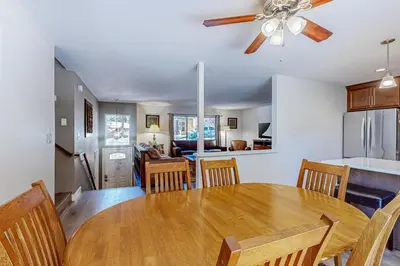 a kitchen and dining room with a table and chairs at Allen Way Escape in Incline Village