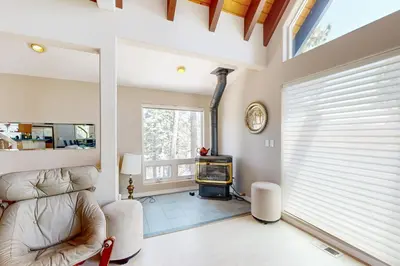 a living room with a couch and a fireplace at Lake View Escape in Incline Village