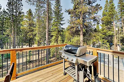 a grill on the deck of a house at Saponi Escape in South Lake Tahoe