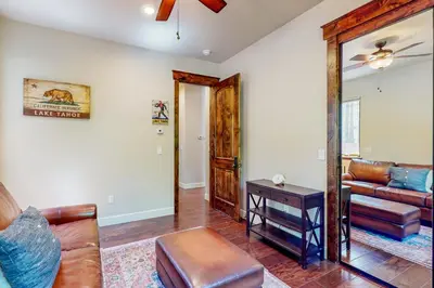 a living room with a couch and a table at Cochise Charms in South Lake Tahoe