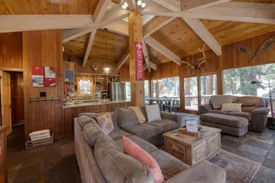 a large living room with a couch and a table at Dodawah Oasis in Carnelian Bay