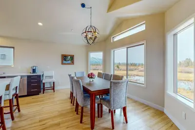a dining room with a table and chairs at Tahoe Keys Haven in South Lake Tahoe