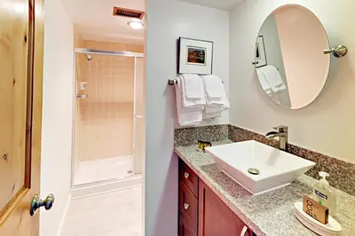 a bathroom with a sink and a shower at Cove 141 in South Lake Tahoe