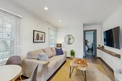 a living room with a couch and a table at Manzanita Holiday 2 in South Lake Tahoe