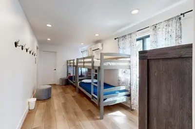 a room with two bunk beds in it at North Lake Adventure in Carnelian Bay