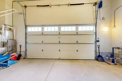 a garage with two garage doors in a room at Luxury Mountain Retreat in South Lake Tahoe