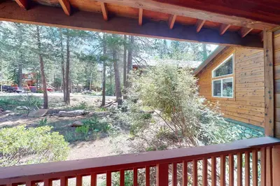 a view of a backyard from a porch of a cabin at Falcon Point Manor in Truckee