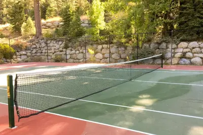 a tennis net on a tennis court at Resort at Squaw Creek's 319 in Olympic Valley