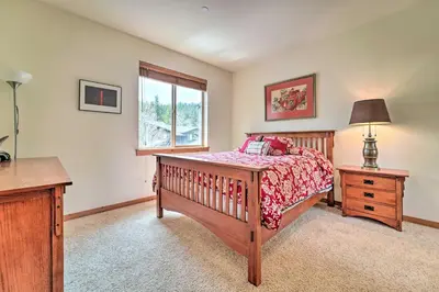 a bedroom with a bed and a window at 2 Mi to Donner Lake Walkable Truckee Condo! in Truckee