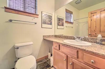 a bathroom with a toilet and a sink at 2 Mi to Donner Lake Walkable Truckee Condo! in Truckee