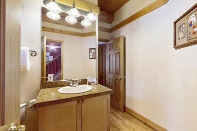 a bathroom with a sink and a mirror at Marshall Haven in South Lake Tahoe
