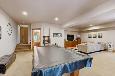 a large room with a pool table in it at Oslo Oasis in Truckee