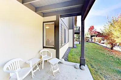 two chairs and a table on a porch at The Boulders Bldg 2 Unit 3 in Truckee