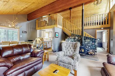 a living room with a couch and a chair at Muhlebach Haven in Truckee
