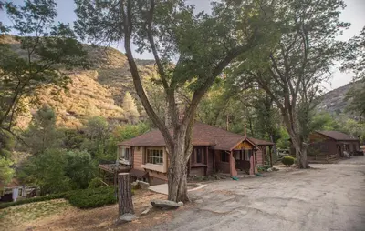 a house in the middle of a mountain at Quiet Mind Lodge, Spa & Retreat Sequoias in Kernville