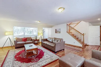 a living room with a couch and a table at Lone Indian Charms in South Lake Tahoe