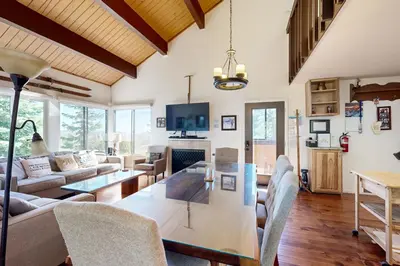 a living room with a table and chairs at Ski Bowl Condos Unit 518 in Truckee