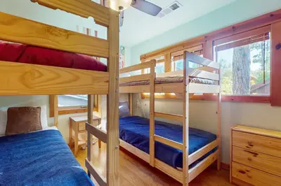 a bedroom with two bunk beds and a bed at Kimque Dreams in Truckee