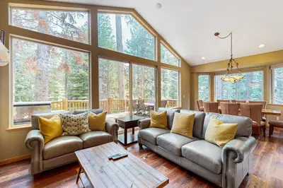 a living room with couches and a table at Cochise Adventures in South Lake Tahoe