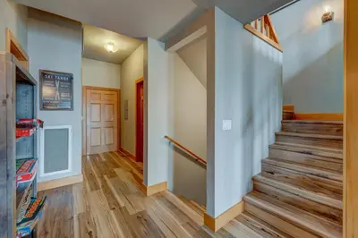 a staircase in a house with wooden floors at Heaven by the Lake in Truckee