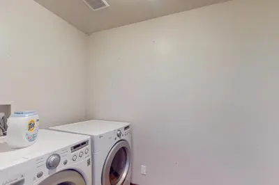 a washer and dryer in a laundry room at Jacarillo Escape in South Lake Tahoe