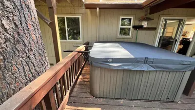a gazebo on the porch of a house at Cozy Cabin in Arnold ! in Arnold