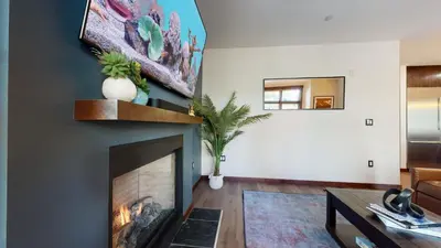 a living room with a fireplace at Solstice #14 condo in Mammoth Lakes