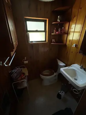 a small bathroom with a toilet and a sink at Sequoia National Forest Cabin-ATV Ride in Panorama Heights