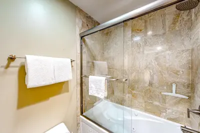 a bathroom with a shower and a glass shower stall at Chamonix 6 in Mammoth Lakes