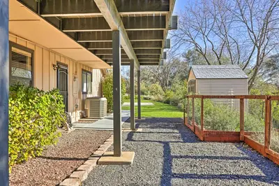 a porch of a house with a fence at Balcony and Scenic View Sonora Hideaway! in Sonora