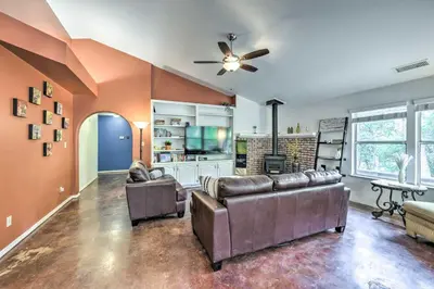 a living room with couches and a ceiling fan at Charming Home Less Than 10 Mi to Sequoia Natl Park! in Three Rivers