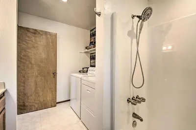 a bathroom with a shower and a sink at Hike, Fish, and Relax Family Arnold Cabin in Arnold