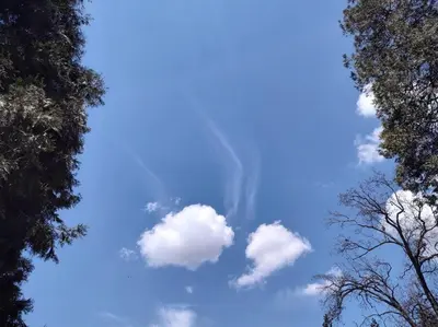 a blue sky with some clouds in the sky at O'Brien's Oasis in Miramonte