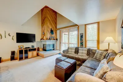 a large living room with couches and a tv at Pine Time in Truckee