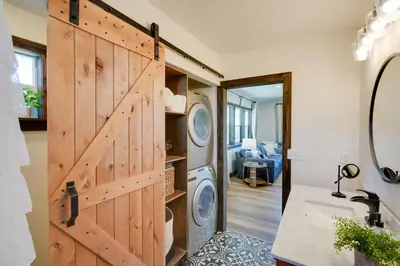a door to a laundry room with a washer and dryer at Charming Lodi Retreat Walk to Local Wineries in Lodi